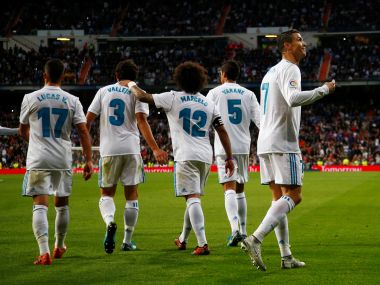 Real MadridÂ’s Cristiano Ronaldo celebrates scoring their third goal with teammates. Reuters