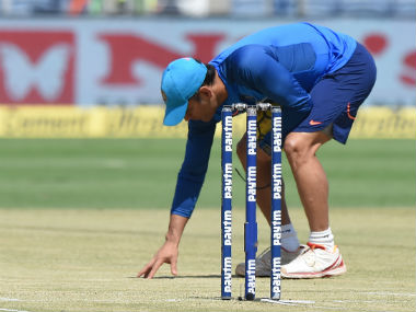 MS Dhoni inspects Eden Gardens pitch while shooting ad with Kapil Dev ahead of 1st India-Sri Lanka Test MS Dhoni inspects Eden Gardens pitch while shooting ad with Kapil Dev ahead of 1st India-Sri Lanka Test