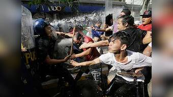 'Dump Trump' protests erupt in Manila as Philippines gears up to welcome US president