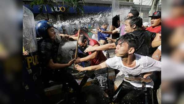 'Dump Trump' protests erupt in Manila as Philippines gears up to welcome US president