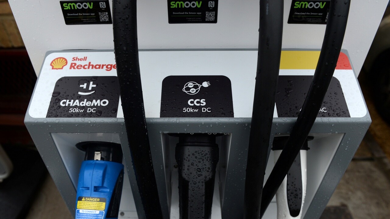 Electric car chargers are seen at the Holloway Road Shell station where Shell is launching its first fast electric vehicle charging station in London, Britain October 18, 2017. REUTERS/Mary Turner - RC1CF1B53430