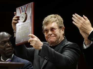 Elton John honoured with Humanitarian of the Year award by Harvard University Elton John honoured with Humanitarian of the Year award by Harvard University
