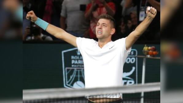 Paris Masters: Filip Krajinovic rallies past John Isner to reach final, ends American's ATP World Tour Finals bid