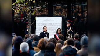 France mourns Paris attack victims two years after tragedy; President Emmanuel Macron lays wreaths at six locations