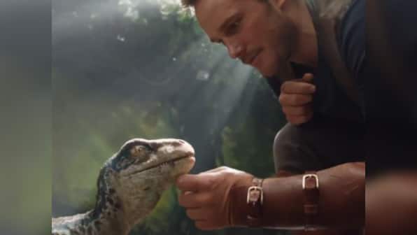 Jurassic World: Fallen Kingdom first glimpse reveals Chris Pratt petting adorable baby raptor