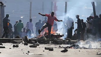 Police fire tear gas as anti-government protests erupt in Kenya despite ban