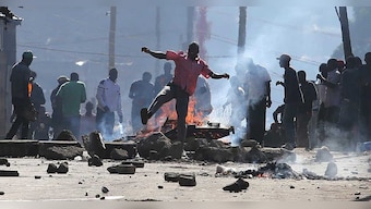 Police fire tear gas as anti-government protests erupt in Kenya despite ban