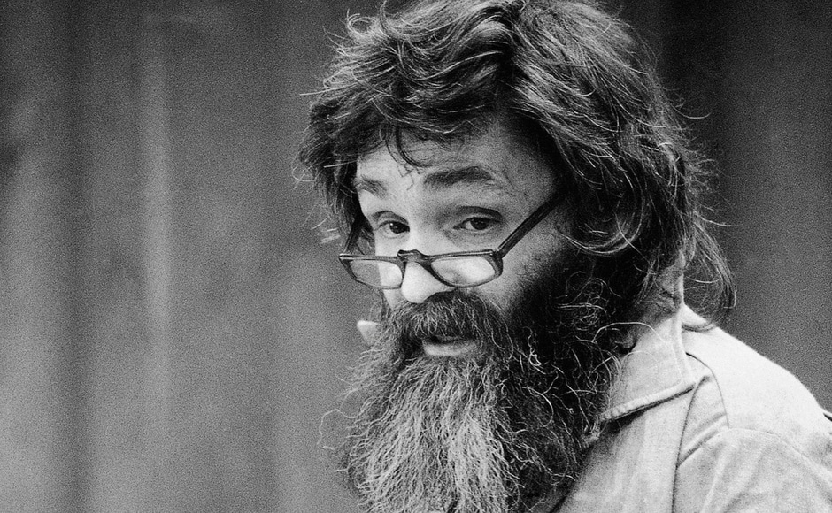 File image of convicted mass murder Charles Manson reading a rambling statement at his parole hearing in San Quentin, California in 1986. Manson had said he would go to Libya, Iran, South America or France if released. AP File image of convicted mass murder Charles Manson reading a rambling statement at his parole hearing in San Quentin, California in 1986. Manson had said he would go to Libya, Iran, South America or France if released. AP
