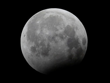 The moon is seen during a partial lunar eclipse. Image: Reuters