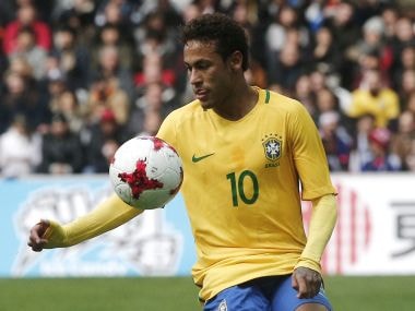 Brazil's Neymar controls the ball during their international friendly against Japan. AP