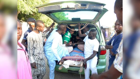 Suicide bombing in Nigeria mosque kills at least 50; police suspect Boko Haram behind attack