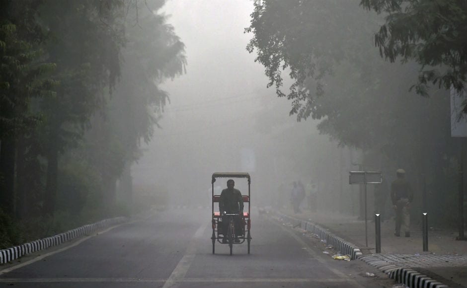 Delhi woke up to a choking blanket of smog on Tuesday as air quality in the world's most polluted capital city reached hazardous levels. PTI Delhi woke up to a choking blanket of smog on Tuesday as air quality in the world's most polluted capital city reached hazardous levels. PTI