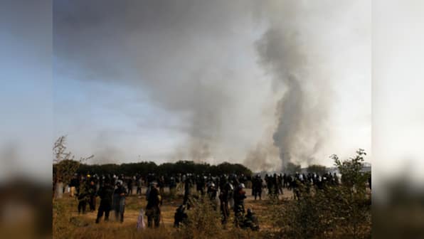 Pakistan police fire tear gas at hardline Islamists blockading Islamabad; TV channels ordered to go off air during crackdown