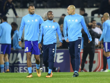 Europa League: Marseille suspend defender Patrice Evra for kicking fan before Vitoria Guimaraes clash Europa League: Marseille suspend defender Patrice Evra for kicking fan before Vitoria Guimaraes clash