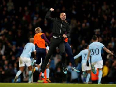Manchester City manager Pep Guardiola celebrates after Raheem Sterling scored team’s second goal. Reuters 