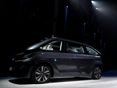 Christophe Sapet, President of French start-up Navya, presents its new driver-less shuttle vehicle. Reuters