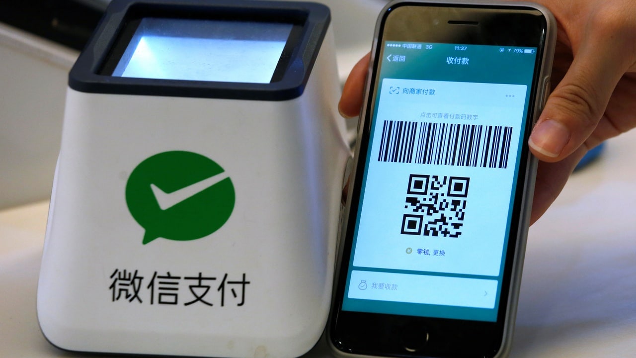 A WeChat Pay system is demonstrated at a canteen as part of Tencent office inside TIT Creativity Industry Zone in Guangzhou, China May 9, 2017. Picture taken May 9, 2017. REUTERS/Bobby Yip - RC171C3E03B0