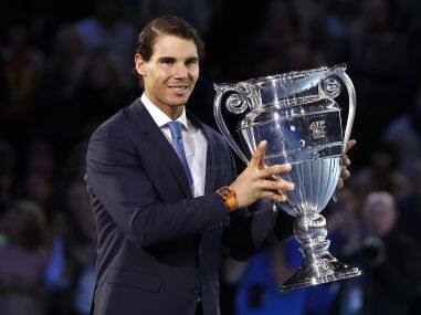 Rafael Nadal holds the trophy after being presented with the ATP World No1 Award. AP