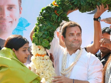 Congress vice president Rahul Gandhi being garlanded at a public meeting at Dahegam of Gandhinagar district on Saturday. PTI