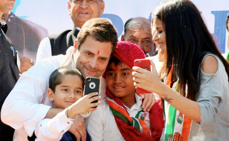 Rahul Gandhi poses for a selfie with children during his public meeting at Dahegam of Gandhinagar district on Saturday. He will also visit villages in Aravalli, Mahisagar and Dahod districts. PTI Rahul Gandhi poses for a selfie with children during his public meeting at Dahegam of Gandhinagar district on Saturday. He will also visit villages in Aravalli, Mahisagar and Dahod districts. PTI