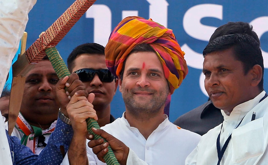 Rahul Gandhi receives a mock plough from his supporters during an election rally in Bayad. He also slammed the Modi govt over high rates of unemployment in Gujarat. AP Rahul Gandhi receives a mock plough from his supporters during an election rally in Bayad. He also slammed the Modi govt over high rates of unemployment in Gujarat. AP