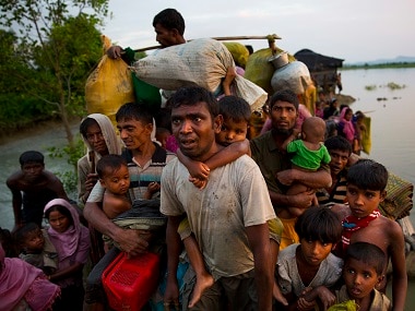 File image of Rohingya Muslims crossing the border from Myanmar into Bangladesh. AP