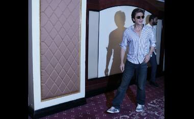 Shah Rukh Khan celebrates his 52nd birthday with press; cuts cake, poses for pictures