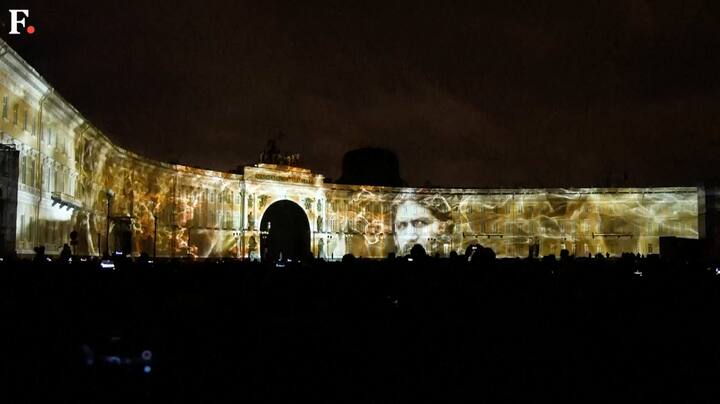 Watch: Russia marks the 100th anniversary of the country's revolution with a parade and festival of lights in Saint Petersburg