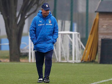 Italy coach Gian Piero Ventura walks on the pitch during a training session ahead of Monday's World Cup qualifying play-off return leg soccer match against Sweden, in Appiano Gentile, near Milan, Italy, Sunday, Nov. 12, 2017. (AP Photo/Antonio Calanni)