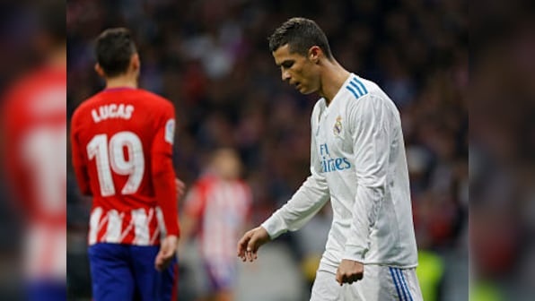 La Liga: Real Madrid's goalless draw with Atletico leaves Barcelona ten points clear at the top