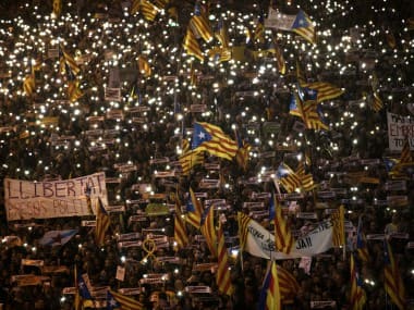 Demonstrators gather during a protest calling for the release of Catalan jailed politicians, in Barcelona. AP