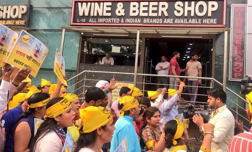 Swaraj India accuses AAP of granting 'illegal' liquor licences, breaking poll promise by not freeing Delhi of addictions Swaraj India accuses AAP of granting 'illegal' liquor licences, breaking poll promise by not freeing Delhi of addictions