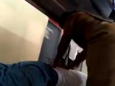 Telangana cop suspended after video shows him getting massage from woman home guard Telangana cop suspended after video shows him getting massage from woman home guard