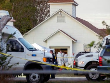 Investigators work at the scene of a deadly shooting at the First Baptist Church in Sutherland Springs, Texas. AP
