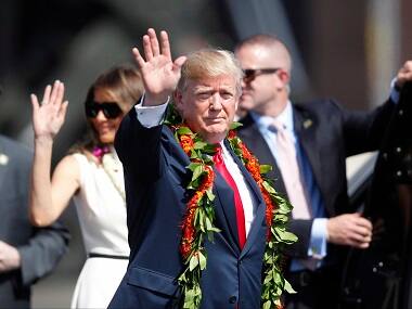 President Donald Trump arrives in Hawaii with first lady Melania Trump. AP