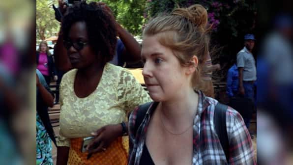 US journalist arrested in Zimbabwe, charged with attempting to overthrow Robert Mugabe