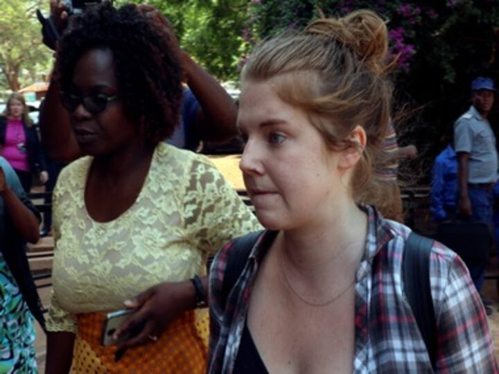 US journalist arrested in Zimbabwe, charged with attempting to overthrow Robert Mugabe