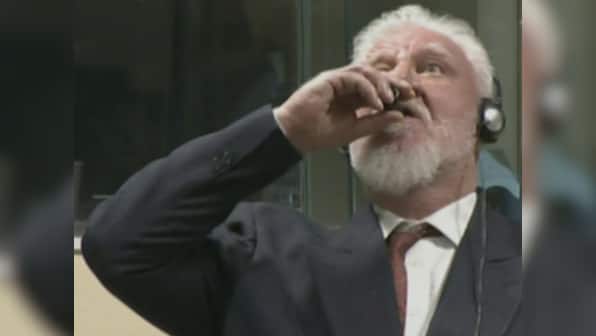 Bosnian Croat war criminal Slobodan Praljak dies after drinking 'poison' in UN court; judges upheld 20-year prison sentence