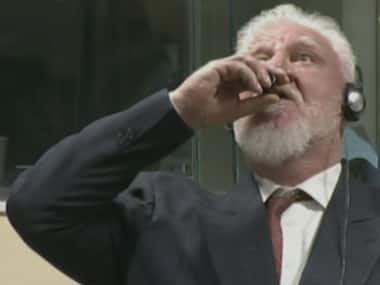 Bosnian Croat war criminal Slobodan Praljak dies after drinking 'poison' in UN court; judges upheld 20-year prison sentence