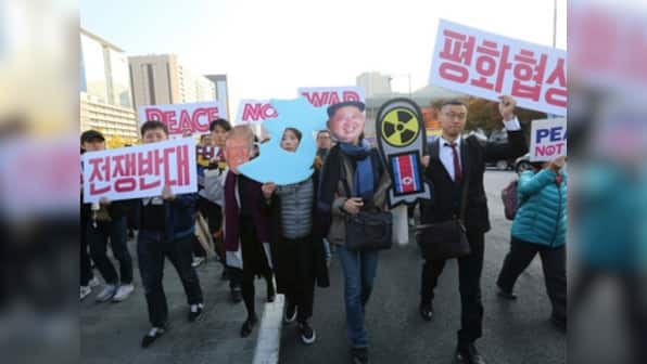 Fearing war with North Korea, hundreds of South Koreans protest Donald Trump's upcoming visit