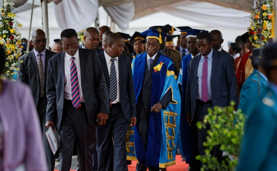 The Friday's event appears to allow Mugabe to project the image of leadership, even as calls for his departure grow stronger. AP The Friday's event appears to allow Mugabe to project the image of leadership, even as calls for his departure grow stronger. AP