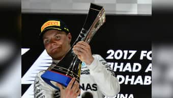 Abu Dhabi Grand Prix: Valtteri Bottas survives high-speed pressure from Lewis Hamilton to claim memorable title