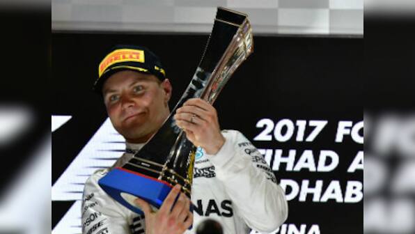 Abu Dhabi Grand Prix: Valtteri Bottas survives high-speed pressure from Lewis Hamilton to claim memorable title
