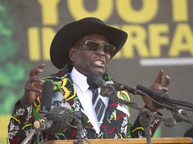 African Union chief Alpha Conde says body will never accept Zimbabwe coup, demands respect for Constitution
