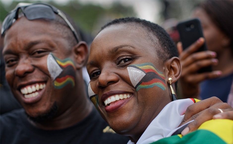 On the streets of the capital, Zimbabweans let their emotions run free as they spoke of political and economic change after two decades of repression and deepening hardship. AP On the streets of the capital, Zimbabweans let their emotions run free as they spoke of political and economic change after two decades of repression and deepening hardship. AP