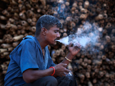 Perks of being a non-smoker: Japanese firms to give more vacation time to employees who don't puff Perks of being a non-smoker: Japanese firms to give more vacation time to employees who don't puff