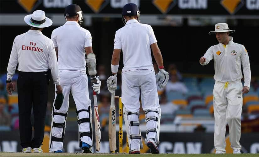 Australian captain Michael Clarke (R) has some heated exchange of words with England’s James Anderson (2nd L) during the fourth day of the first Ashes Test in in 2013. Reuters