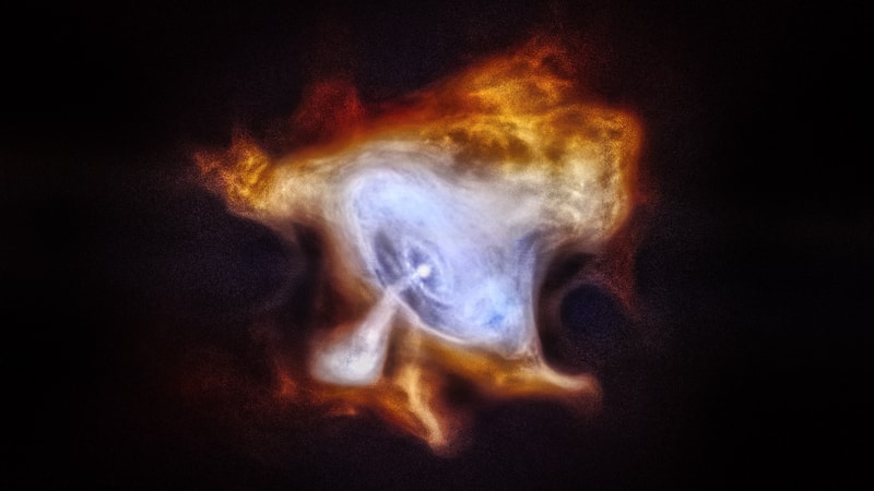 At the center of the Crab Nebula is an extremely dense pulsar which is spewing out a blizzard of high-energy particles. NASA