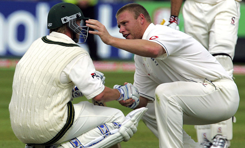 England’s Andrew Flintoff consoles Australian Brett Lee after England beat Australia by just two runs to win the Second Test at Edgbaston cricket ground in Birmingham in 2005. AFP