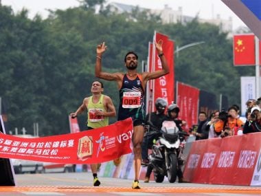 Gopi Thonakal crosses the finish line at the 16th Asian Marathon Championship. IMahe courtesy: Twitter/@afiindia